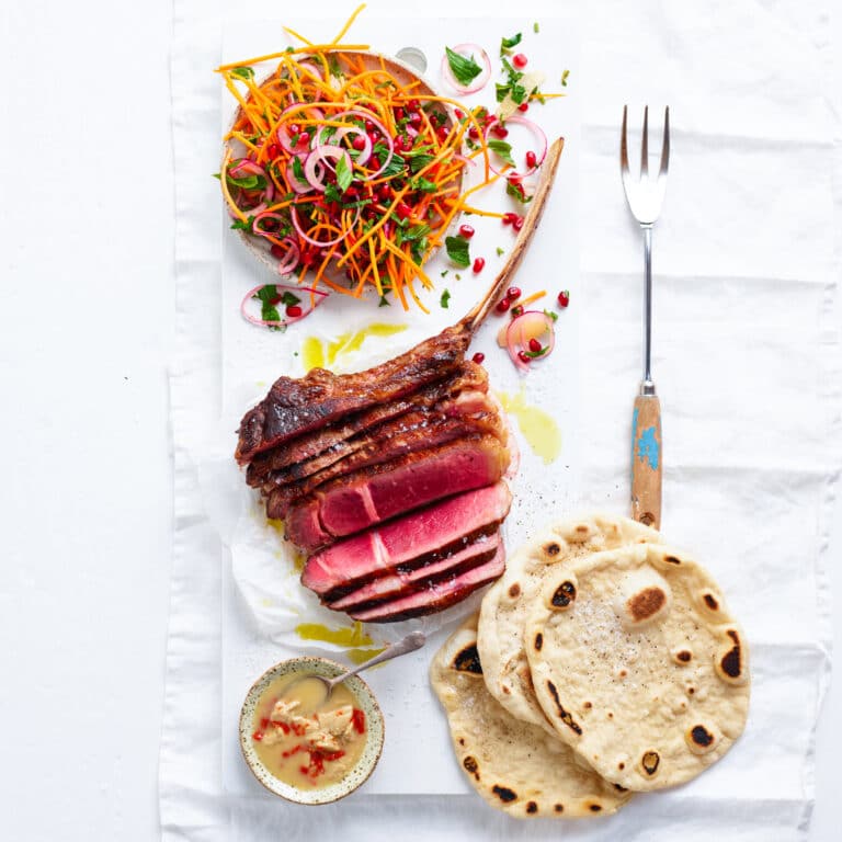 SUMAC-SPICED TOMAHAWK WITH PERSIAN CARROT SALAD